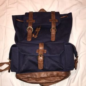 Navy Blue Backpack With Brown straps and Bottom